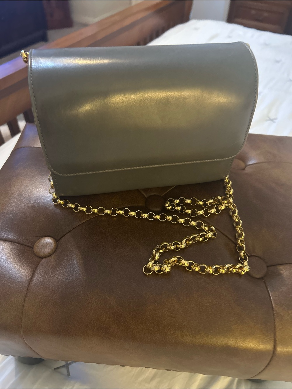 Authentic Salvatore Ferragamo Grey leather crossbody with gold chain